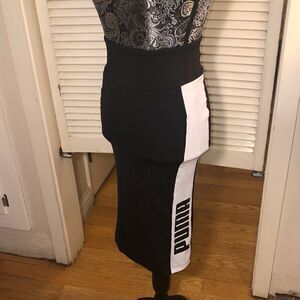 Puma Highwaisted Stretch Midi Side Stripe Play Skirt. Play all day and night!
